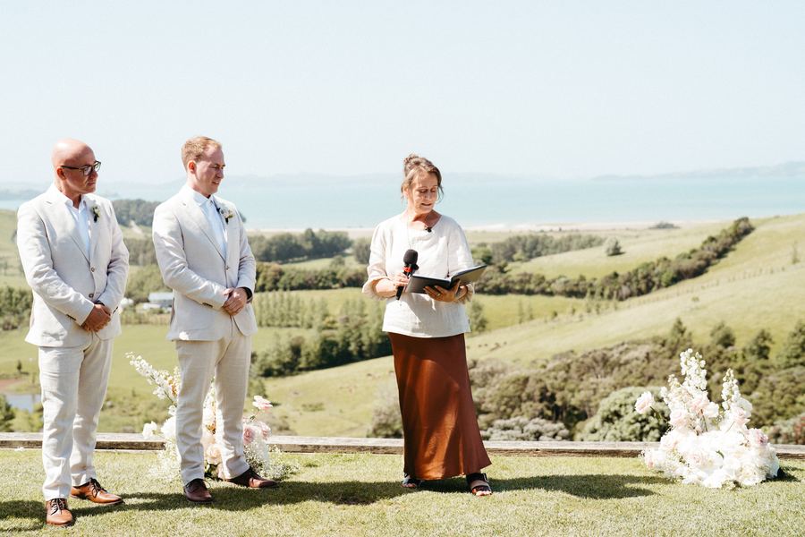 The groom and groomsman wait with Tracy for the bride to arrive